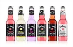 Bottles of Jack Daniels in Different Flavors on White Background